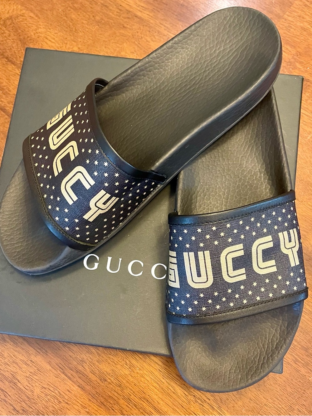 GUCCI~519996 “Guccy” Slides, Black/Gold, Unisex